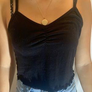 cinched black tank top